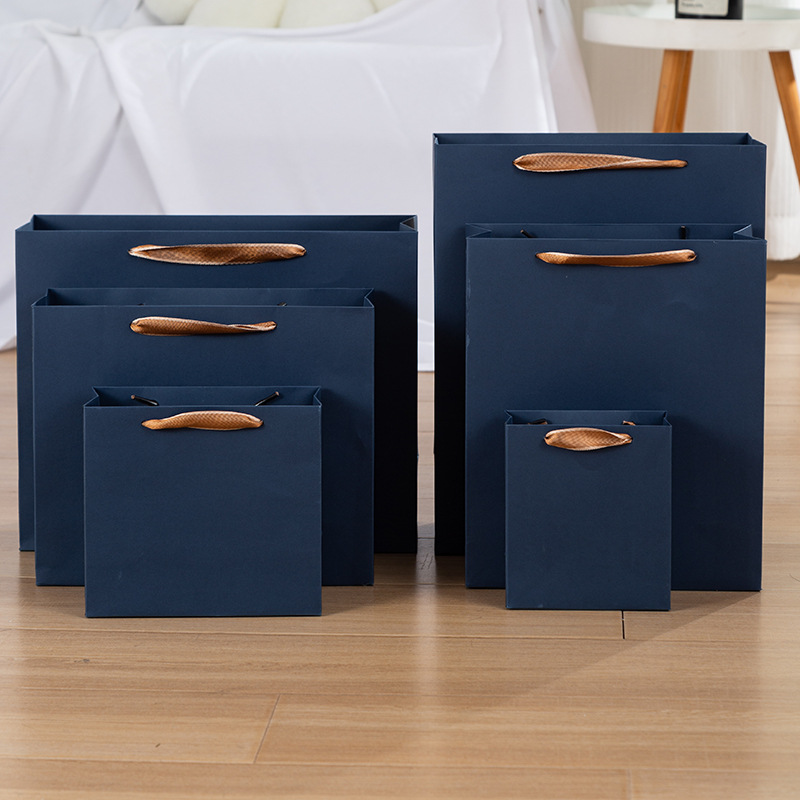 Picture of dark blue Paper Bag Clothing Gift Packaging Handbag High-end Thickened Paper Bag in stock Zhuo Fan Paper Bag