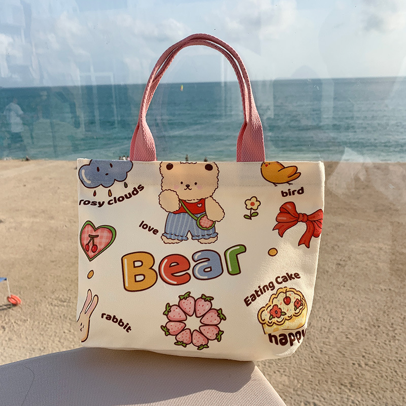 Picture of 2025 New Cute Cartoon Japanese Style Canvas Bag Tutorial Lunch Bag Manufacturer Wholesale Bag Women's Bag Handbag