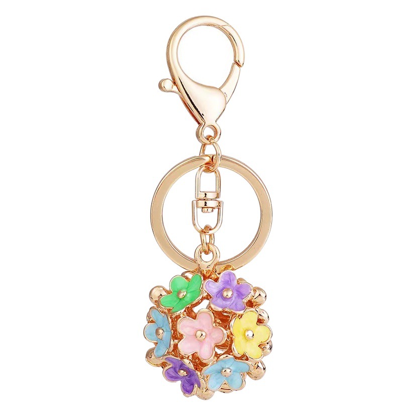 Hollow daisy flower car key chain metal Women's bag pendant key chain ring cross-border business creative gifts
