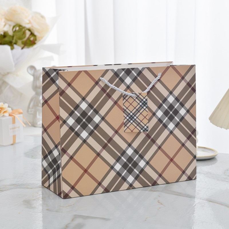 Picture of New horizontal plate thickened gift bag business fashion gift hand-held paper bag stationery jewelry store clothing packaging bag