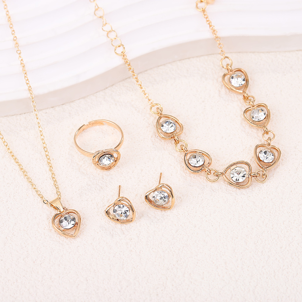 Picture of Amazon Cross-border European and American Crystal Love Jewelry Fashion Temperament Peach Heart Necklace Earrings Ring Bracelet Four-piece Set