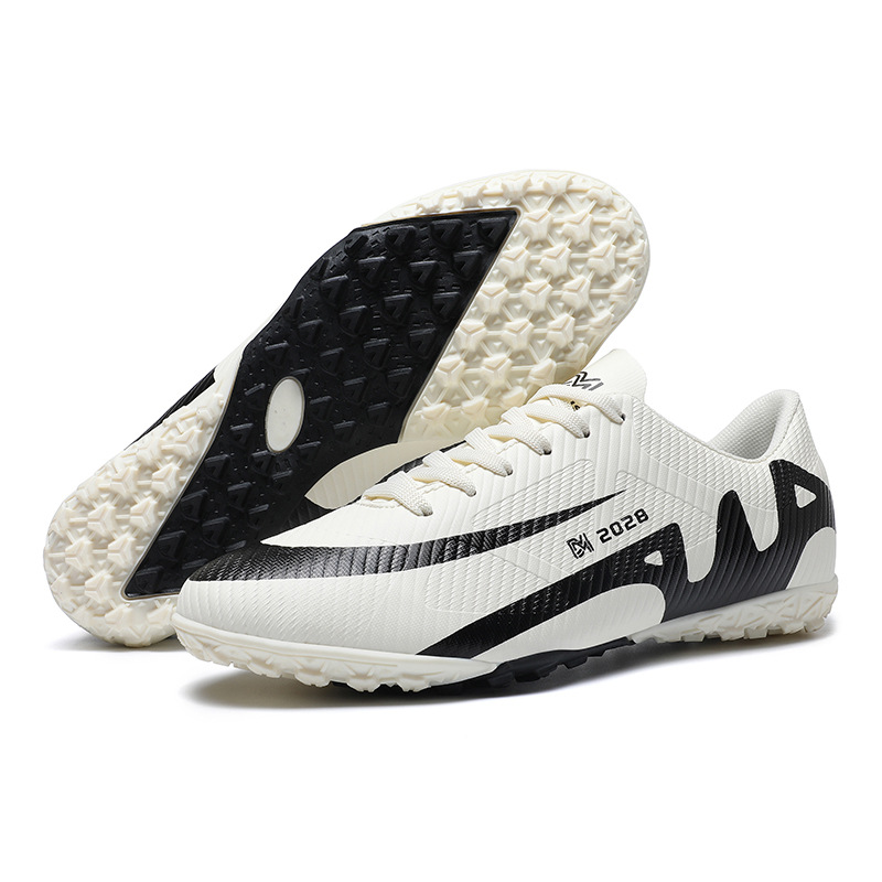 Picture of Cross-border New Assassin Football Shoes Adult Training AG Spike TF Broken Nails Youth Student Training Shoes Wholesale