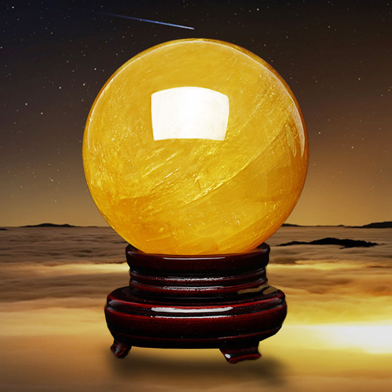 Natural yellow crystal ball ornaments yellow crystal ball original stone size a generation of direct selling gifts
