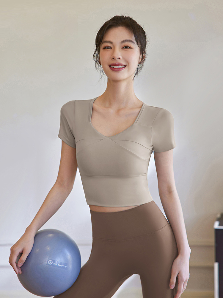 Picture of 2025 Summer Yoga Wear Women's Short Sleeve Fitness Clothes Training Tops Slim Fit Running Sports T-Shirt