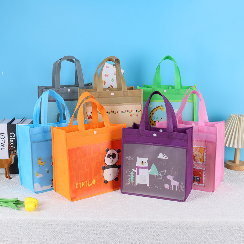 Factory cute cartoon with outer pocket button non-woven handbag gift bag printed logo pattern word
