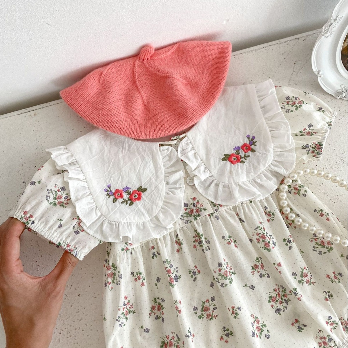 Picture of 2025 Western Style Baby Summer Jumpsuit Floral Triangle Hoodie Embroidered Large Lapel Short-Sleeved Baby Girl