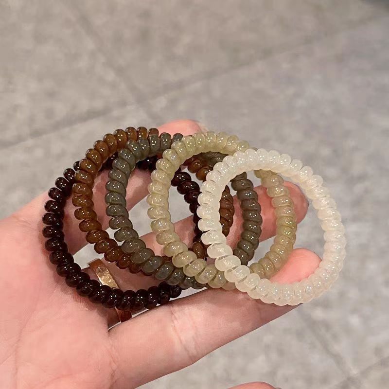 Transparent telephone line head rope small rubber band hair band does not hurt hair tie hair rope black simple seamless leather hair accessories