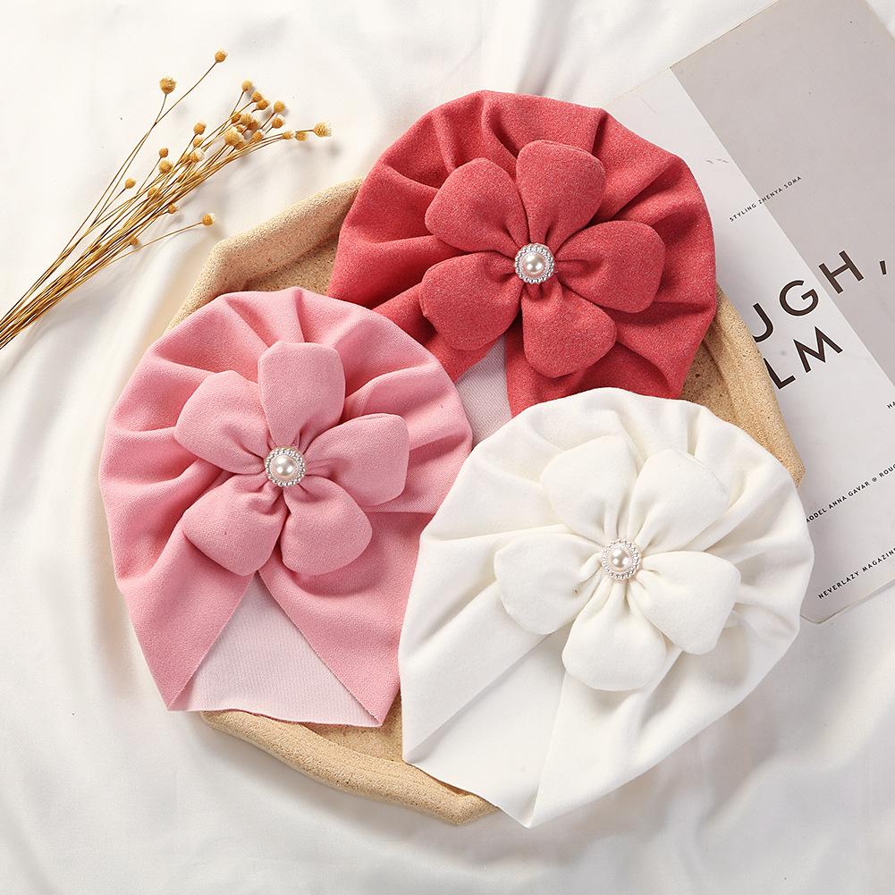 Picture of Cross-border new baby autumn and winter pullover cap imitation cashmere children's Indian hat infant Pearl Flower brimless hat
