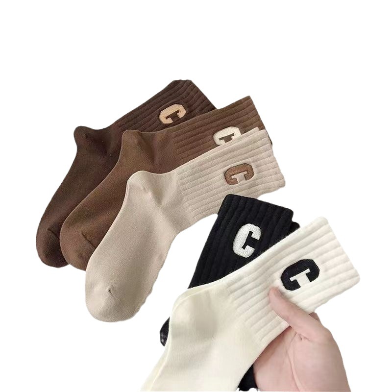 Autumn and winter socks for women ins fashionable all-match letter mid-length College wind Net red sports outer wear winter black stockings