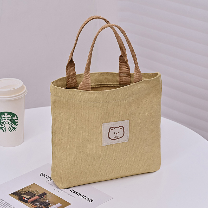 Picture of 2025 New Cute Cartoon Japanese Style Canvas Bag Tutorial Lunch Bag Manufacturer Wholesale Bag Women's Bag Handbag