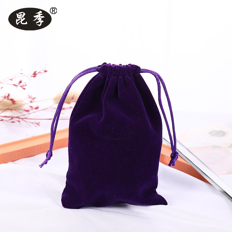 Picture of Boutique bunched flannel bag first jewelry seal text play packaging bag printed electronic products hand string gift storage bag