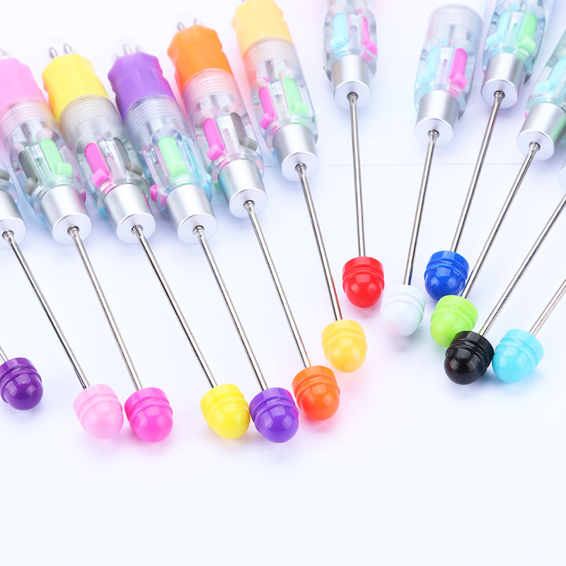 Picture of Factory Direct four-color beaded pen DIY multi-color refill ballpoint pen key mark press plastic gift pen