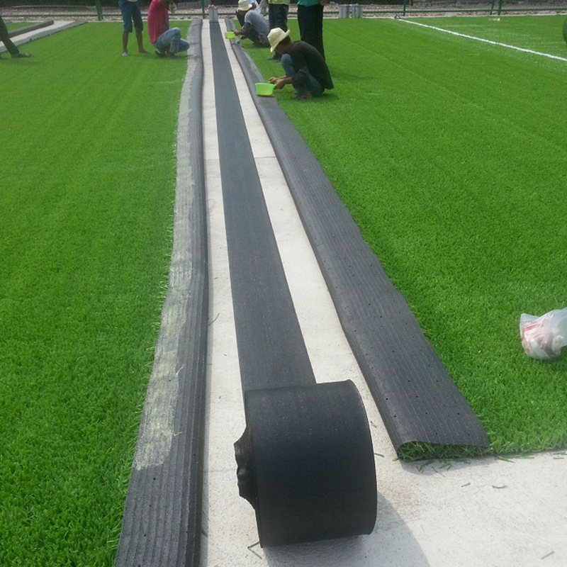 Picture of Kindergarten simulation lawn joint with outdoor football field construction joint with special joint cloth for playground turf