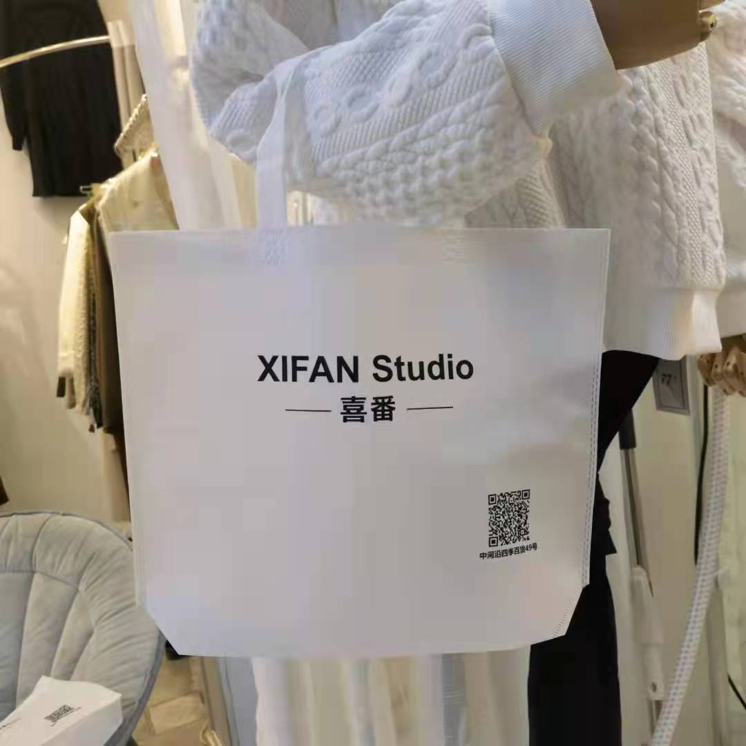 Clothing store bag printed shop name non-woven spot bag portable advertising packaging bag sewing film bag printed LOGO