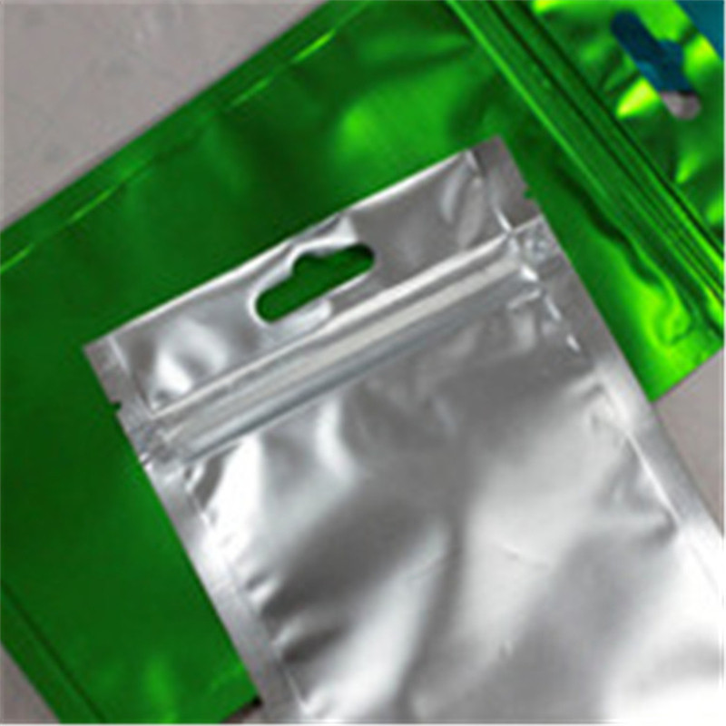 In stock 9 * 15cm aircraft hole green aluminum foil Yin and Yang bone bag color mobile phone jewelry sealed pocket translucent