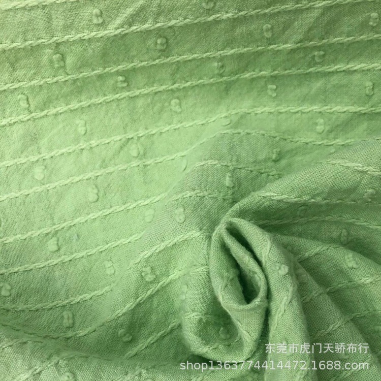 Spot supply of spring and summer new cotton woven jacquard fabric 116 grams of millet cut yarn jacquard fashion material