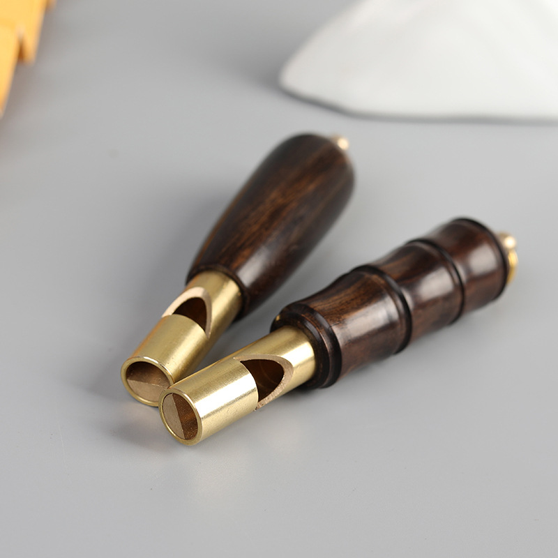 Picture of Brass Red Sandalwood Outdoor Lifesaving Whistle Keychain Pendant Competition Tall Whistle Mountaineering Training Pendant