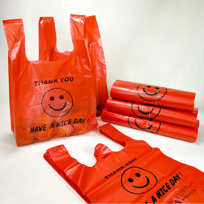 Plastic vest bag large 32 carrying bag red smiley face shopping packing bag supermarket convenience bag vest tote bag