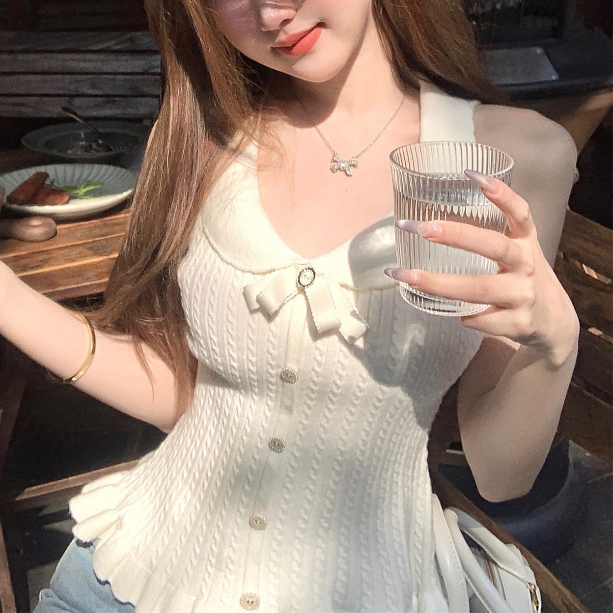 Pure Wish Flanging V-Neck Bow Slimming Knitted Vest Women's 2025 Summer Elegant Sleeveless Short Spice Girl Top