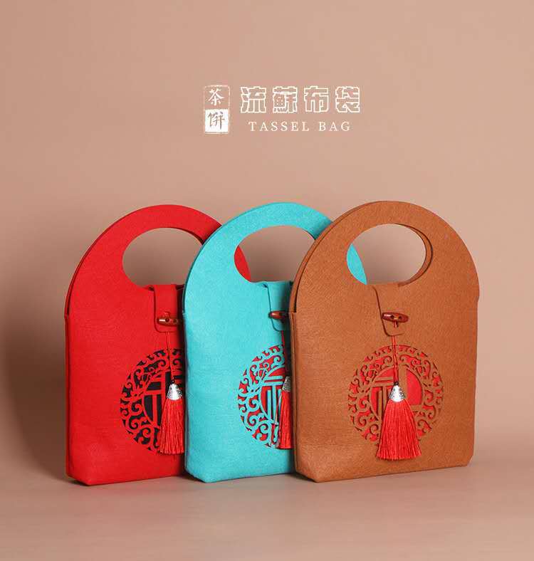 Wholesale 357G Pu'er tea cake Fuding white tea seven-seed tea cake gift bag packaging non-woven felt Tea Cake bag