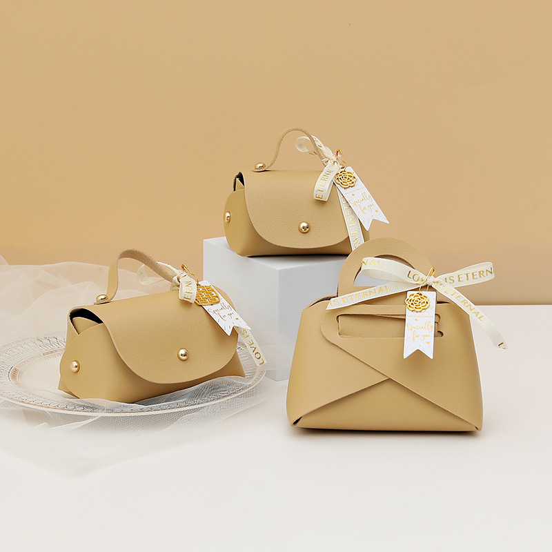 Picture of European Creative Wedding Candy Box Leather Ins Style Satchel Wedding Candy Bag Wedding Souvenir Gift Candy Gift Box