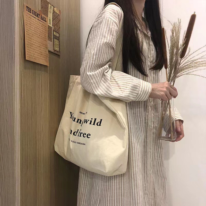 Picture of New Large Capacity Letter Zipper Shoulder Bag Canvas Bag Women's Retro Artistic Simple Student Commuter Tote Bag