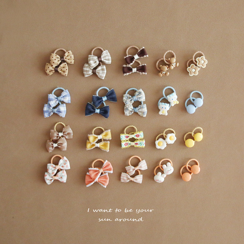 Picture of A152 factory wholesale children's cute headdress hair accessories baby mini bow thumb rubber band suit 1 set
