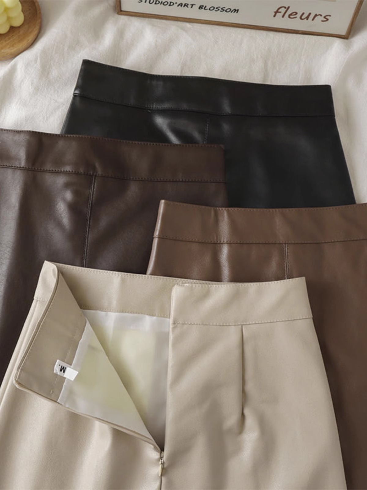 PU leather skirt women's 2023 autumn and winter new high waist slimming hip skirt leather casual Korean A- line skirt
