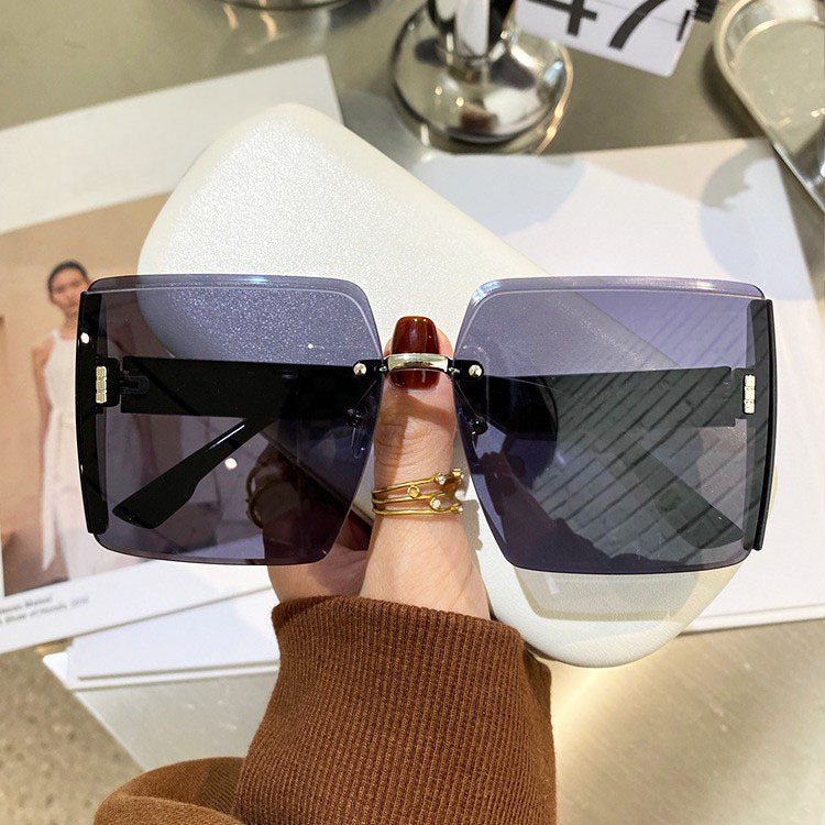 Picture of Em Home 2025 New Frameless Sunglasses Women's Glitter Mirror Edge Anti-Uv Big Face Slimming Live Broadcast Sunglasses