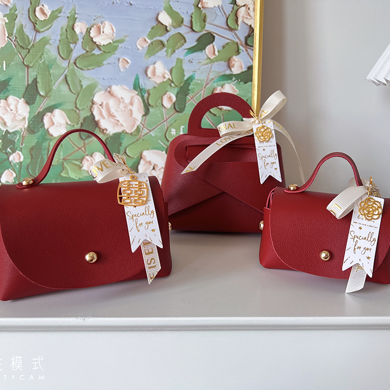 Picture of European Creative Wedding Candy Box Leather Ins Style Satchel Wedding Candy Bag Wedding Souvenir Gift Candy Gift Box