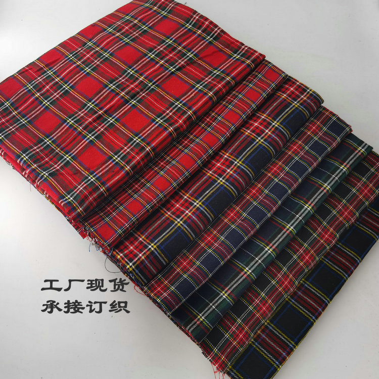 Spot 300D polyester cotton Scottish children's clothing jacquard plaid school uniform JK skirt fabric toy decorative fabric