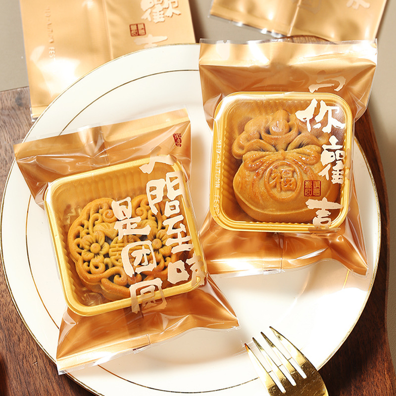 New thickened golden calligraphy moon cake packaging bag 50g 75g100 flow heart egg yolk crisp machine bag wholesale