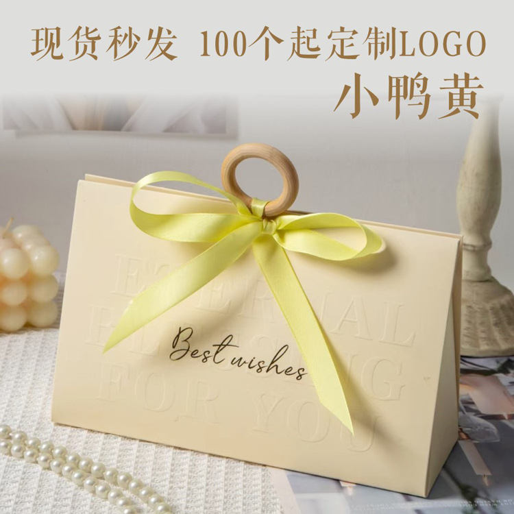 High-End Business Gifts in Stock Wooden Ring Handle Handbag Wholesale Souvenir Paper Bag Thickeneded with Printable Logo