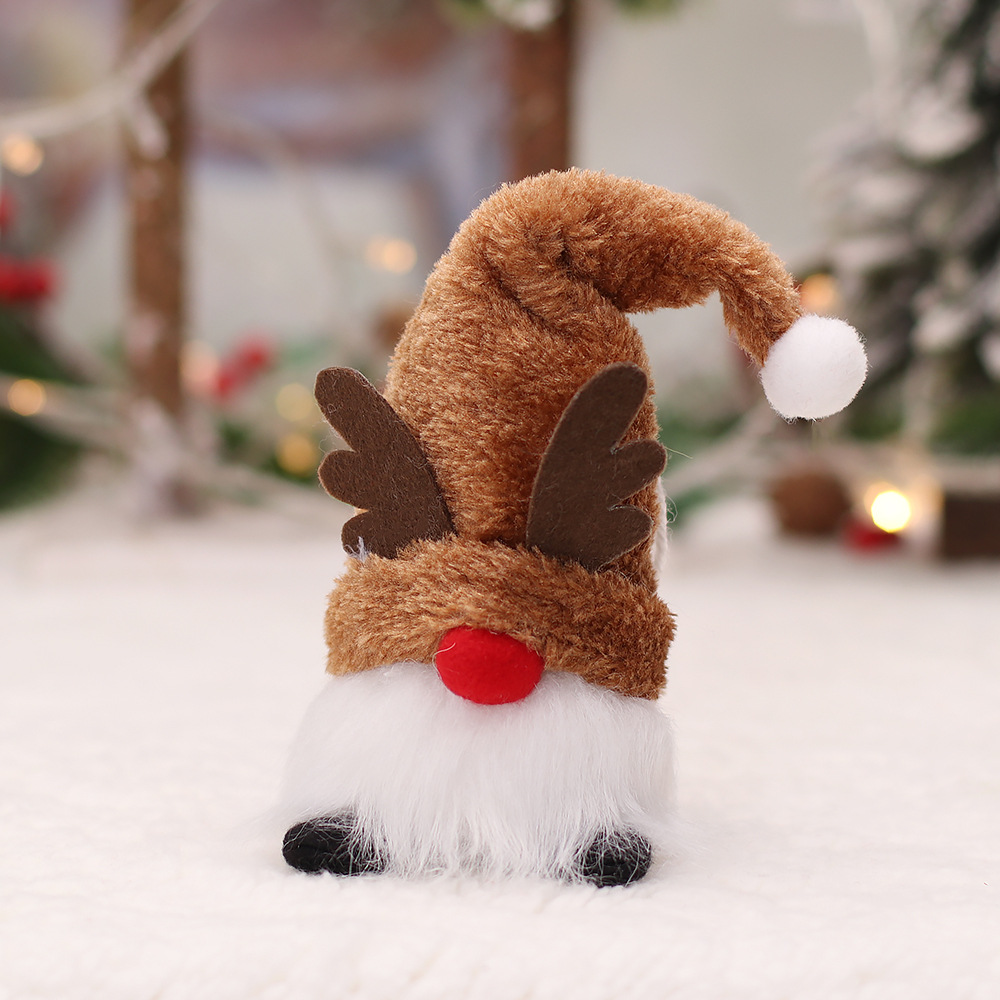 Picture of Christmas supplies with lights glowing old man Forester figure Rudolph dwarf doll Christmas tree decoration pendant