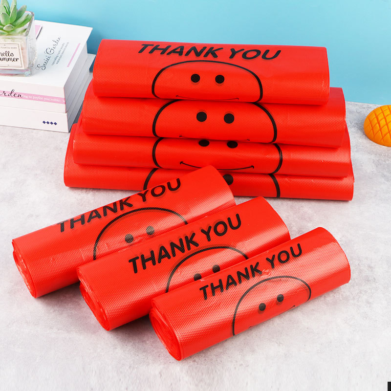 Extra thick plastic bag red supermarket shopping bag food packing bag portable vest bag smiley face convenient bag wholesale