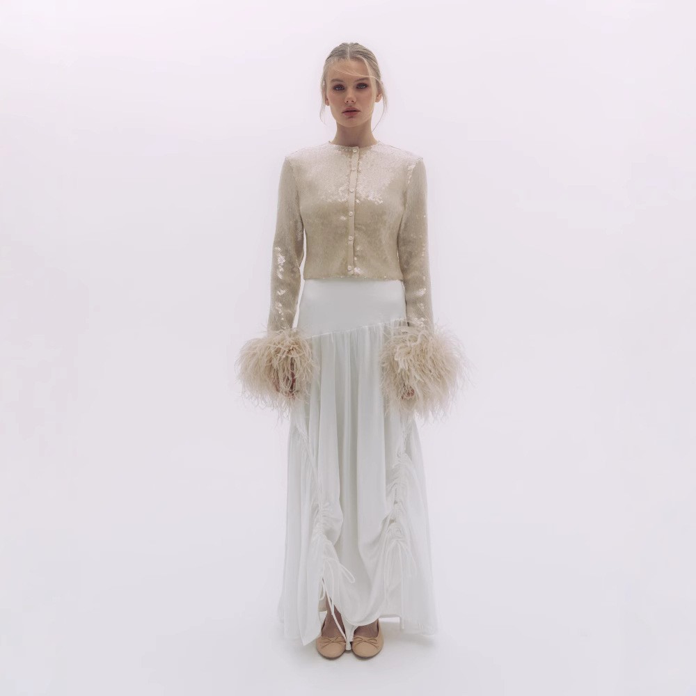 Sequined feather sleeve topEuropean and American nightclub style versatile light luxury sequin feather sleeve top