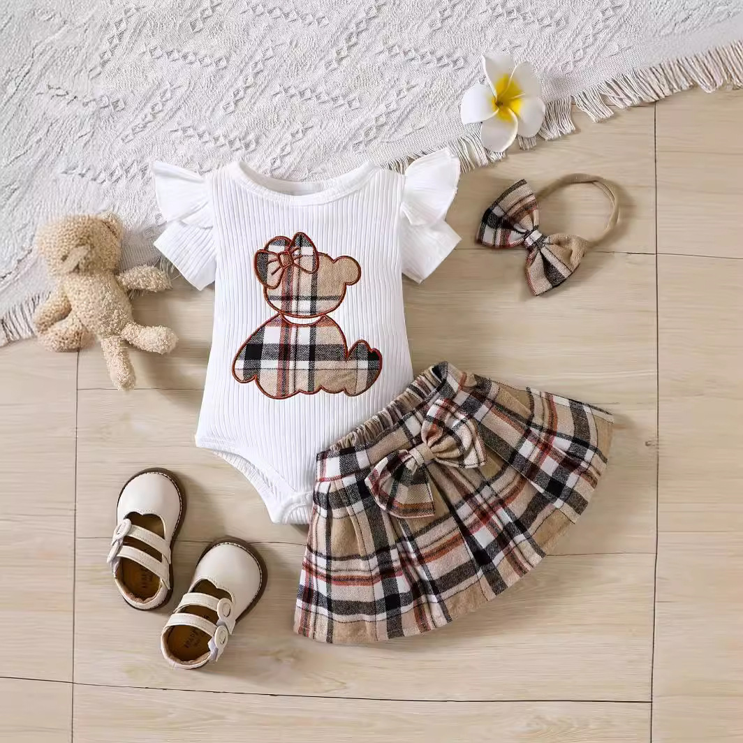 Picture of Cross-border INS newborn baby bag fart triangle khayi baby girl plaid skirt summer bear two-piece suit