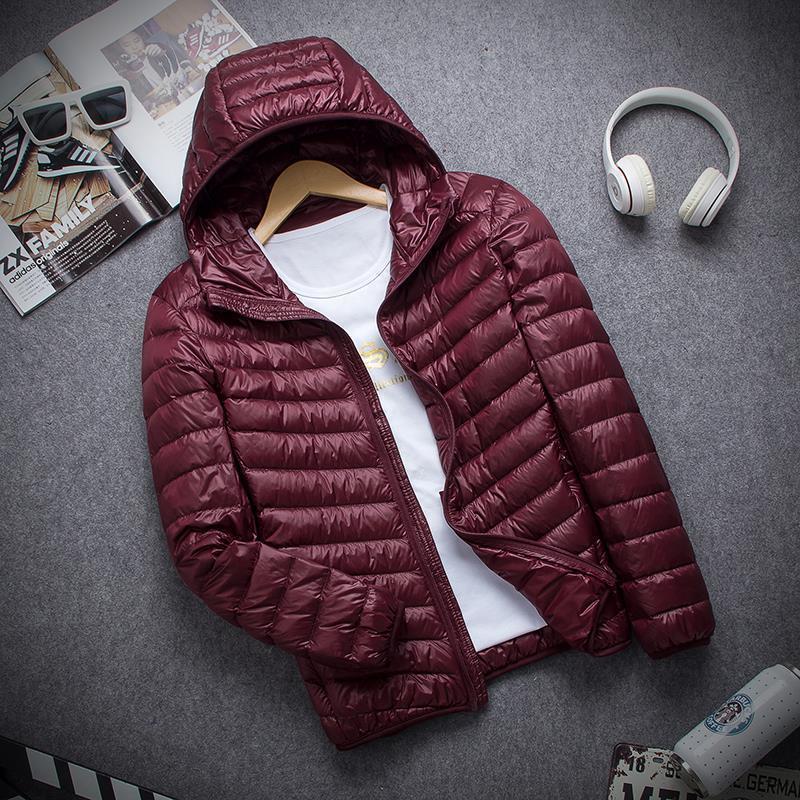 Picture of Women's Short Thin Down Cotton-padded Jacket Women's Black Hooded Lightweight Cotton-padded Coat Autumn and Winter Lightweight Slim-fit Coat plus size