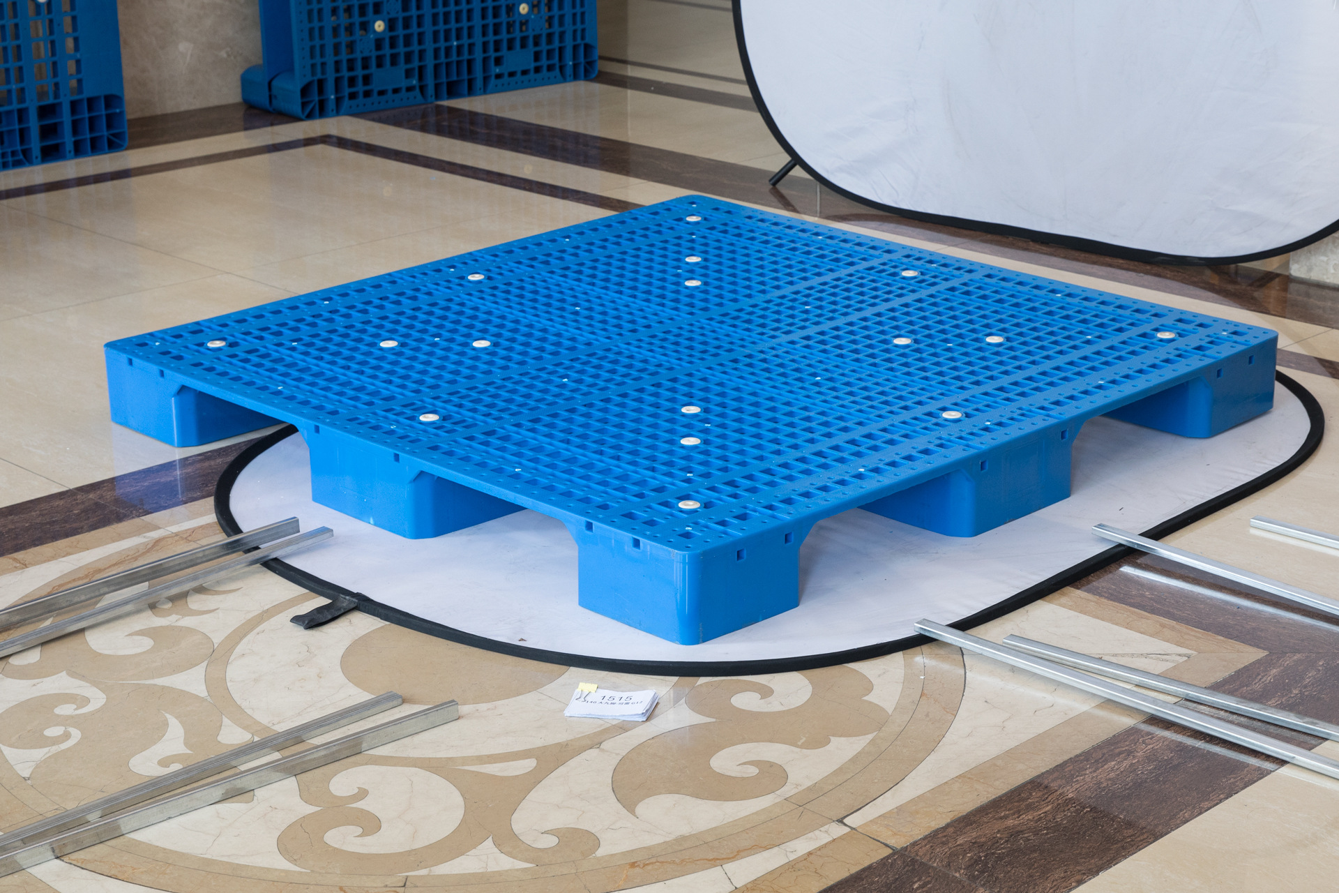 Picture of Flat Nine-Legged Plastic Pallet Moisture-Proof Pad Storage Transfer Logistics Pallet Forklift Platform Thickened Version