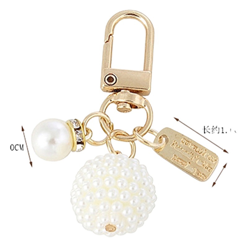 Picture of New Pearl Alloy Keychain Pendant Creative Pearl Hollow Love Accessories Bluetooth Headphone Box Bag Pendant