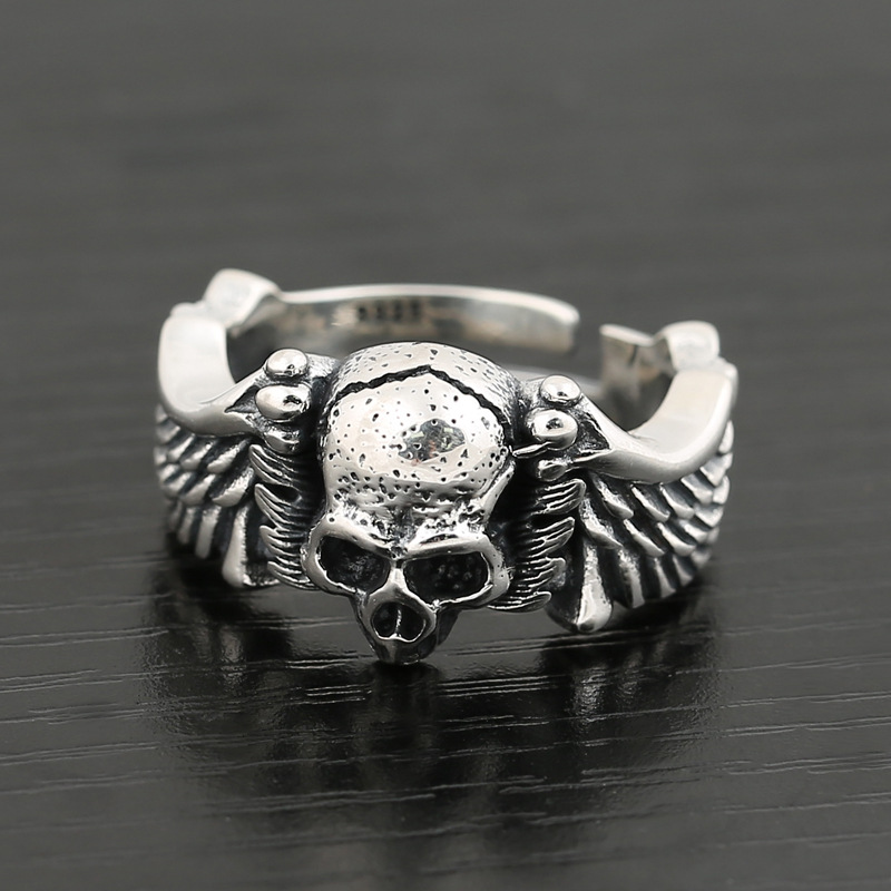 Manufacturers wholesale sterling silver S925 punk style hip hop personality wings skull open finger ring a generation of hair