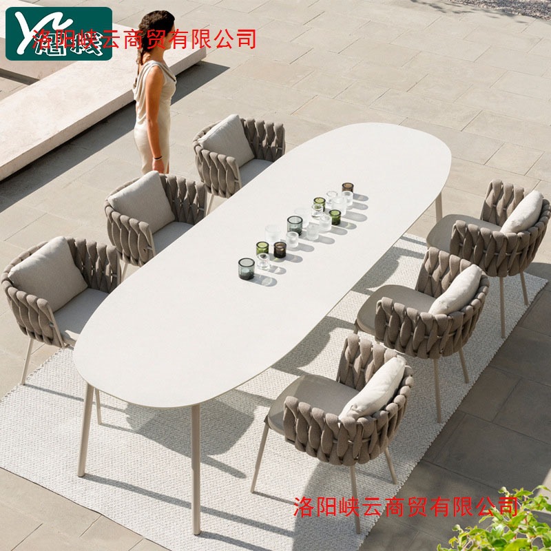 Outdoor table and chair combination courtyard Nordic garden furniture open-air waterproof and sunscreen balcony leisure rattan western dining table and chairs