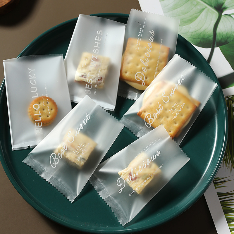 Thickened snowflake crisp packing bag machine sealed bag baking milk jujube cow rolled cake cookie small biscuit candy bag wholesale