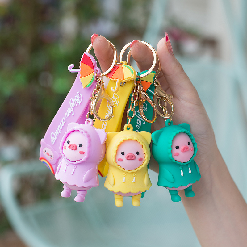 Raincoat pig key chain pvc doll cute key chain pendant bag pendant Yiwu commodity gift wholesale