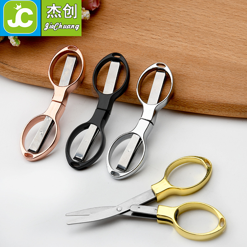 Picture of Stainless steel folding scissors plastic handle/alloy stretch shear travel portable fishing Special 8/eight character scissors wholesale