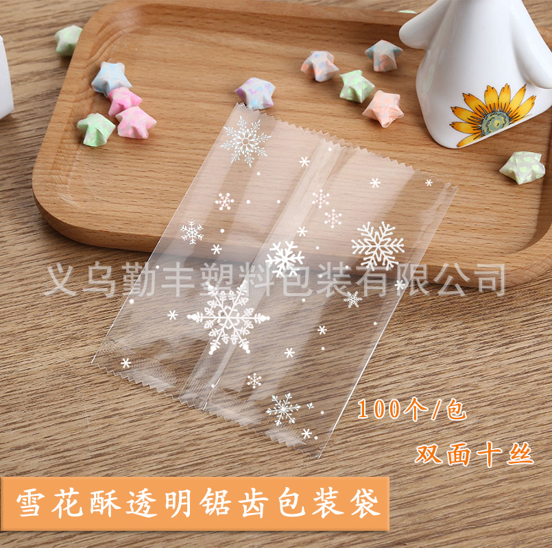 New snowflake crisp packing bag machine sealing cow tie biscuit bag transparent saw-tooth cow rolling mill sealing bag 100