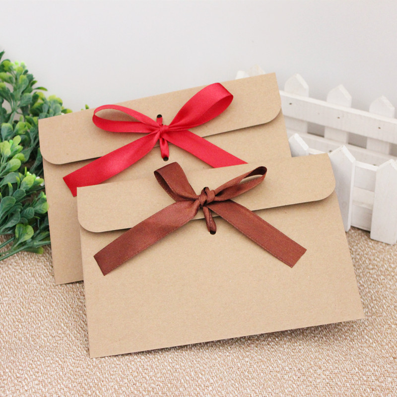 Picture of European envelope Kraft paper style vintage greeting card blessing card packaging bag creative bow CD bag wholesale