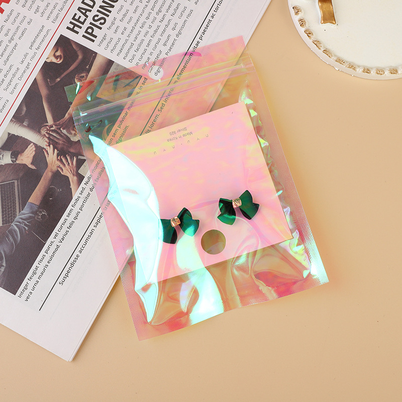Picture of A variety of laser Yin and Yang bone bag data line hardware products self-sealing bag Electronic Packaging bag jewelry plastic bag