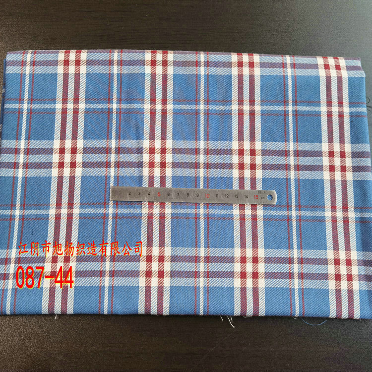 Picture of in stock brushed plaid fabric spring and summer women's shirt cloth 21 polyester cotton woven flannel plaid lining