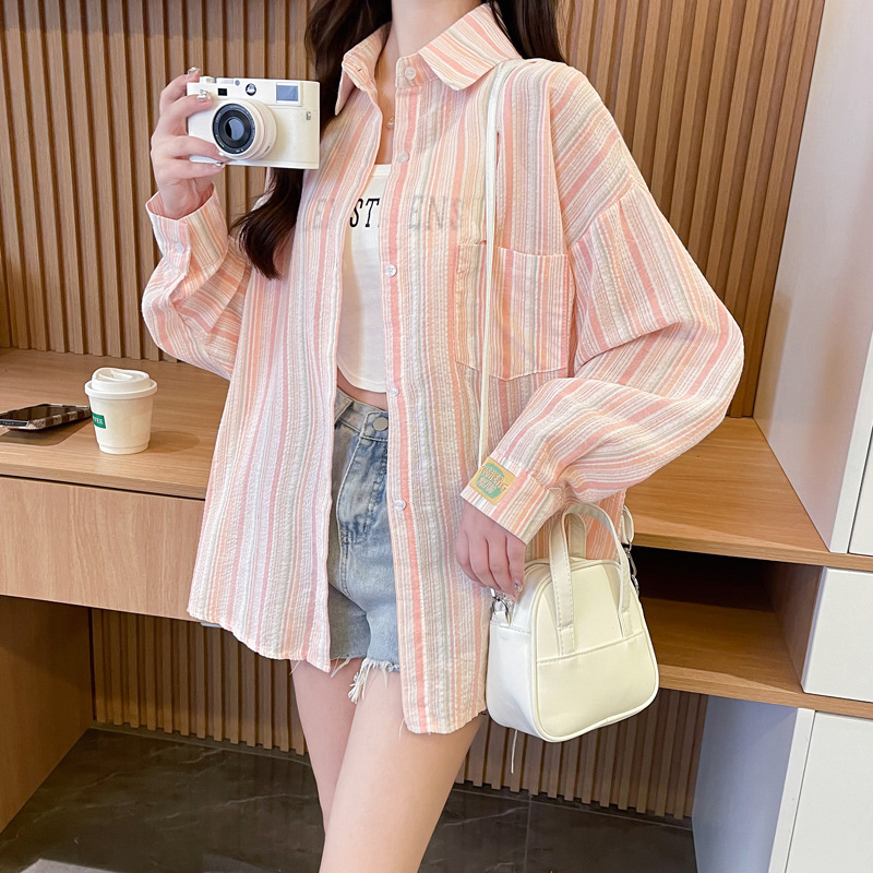 Picture of Summer high-grade Korean style retro fashion vertical striped long-sleeved shirt Women's loose casual niche sun protection top fashion